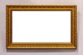 Golden picture frame on wall with clipping path Royalty Free Stock Photo