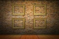 Golden picture frames on yellow brick wall Royalty Free Stock Photo