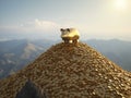 Golden Piggy Bank on a Mountain of Coins Royalty Free Stock Photo