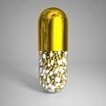 Golden pill Royalty Free Stock Photo