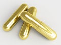 Golden pills Royalty Free Stock Photo