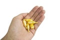 Golden Pills in Hand Royalty Free Stock Photo