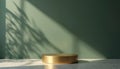 Golden podium on marble surface against sage green background. Shadows of leaves create pattern on wall. Empty stage for public Royalty Free Stock Photo