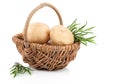 Golden Potatoes in wicker basket, with rosemary Royalty Free Stock Photo