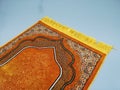 golden prayer mat