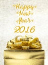 Golden Present box with Happy New Year 2016 word at bokeh light Royalty Free Stock Photo