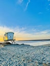 Golden Radiance: Lifeguard Tower Illuminated at Ocean Beach, San Diego