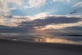 Golden rays on the Atlantic Ocean as the sun rises.