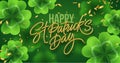 Golden realistic lettering Happy St. Patricks Day with realistic clover leaves background. Background for poster, banner Royalty Free Stock Photo