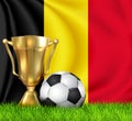Golden realistic winner trophy cup and soccer ball isolated on national BELGIUM flag. National team is the winner of the football. Royalty Free Stock Photo