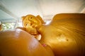The golden reclining Buddha image in the temple Royalty Free Stock Photo