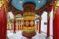 The Golden And Red Prayer Wheel At The Soma Gompa In The Indian Himalayas Near The Leh Royal Palace.