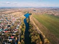 Golden red sunlight AERIAL view, Russia, River, small town, bridge Royalty Free Stock Photo