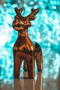 Golden reindeer Christmas decoration on top of a table Royalty Free Stock Photo