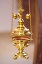 Golden religious utensils. Details in the Orthodox Christian Church. Russia