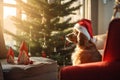 Golden retriever dog wearing Santa hat in living room with Christmas tree Royalty Free Stock Photo
