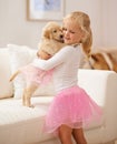 Golden retriever, hug and child happy together with love, care and development. Cute girl kid and animal puppy or pet in Royalty Free Stock Photo