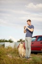 Happy labrador enjoy playing on beach with owner. Royalty Free Stock Photo