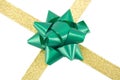 Golden ribbon with green bow