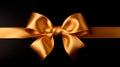 Golden ribbon with red bow isolated on black background.Holiday Festive Party Winning Banner Royalty Free Stock Photo