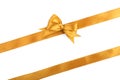 Golden ribbons with beautiful bow on white background Royalty Free Stock Photo