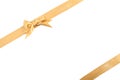 Golden ribbons with beautiful bow on white background Royalty Free Stock Photo