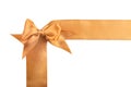 Golden ribbons with beautiful bow on white background Royalty Free Stock Photo