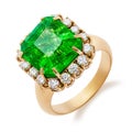 Golden ring with big emerald and diamonds isolated Royalty Free Stock Photo