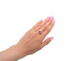 Golden ring with big sapphire and diamonds on woman`s hand Royalty Free Stock Photo