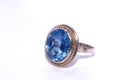 Golden ring with blue aquamarine