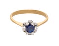 Golden ring with big sapphire and diamonds Royalty Free Stock Photo