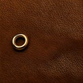 Golden ring over leather texture background, brown leather material pattern close view square illustration Royalty Free Stock Photo