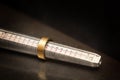 Golden ring on a ring sizer gauge, jeweler sizing tool from ste