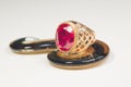 Golden ring with the ruby. jewelry background Royalty Free Stock Photo