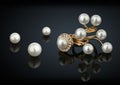 Golden rings with diamonds and pearls on black background Royalty Free Stock Photo