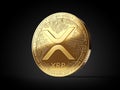 Golden Ripple XRP cryptocurrency coin isolated on black background. 3D rendering Royalty Free Stock Photo