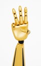 Golden robotic hand showing number three