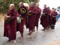 Golden Rock, Myanmar; 08/18/2017: Offering to the monks on the golden rock in myanmar