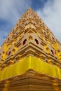 Golden roof gable temple under clear sky