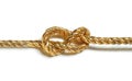 Golden rope with nautical knot isolated on white
