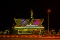 The Golden Roundabout& x28;Bundaran Emas& x29;A statue of the head of the Dayak tribe with a large wing in the background.