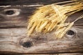 Golden Rye Spikelets Over dark Wooden Background Royalty Free Stock Photo