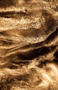 Golden sand abstract resin art swirl luxury background. Liquid