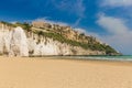 Golden sand beach of Vieste with Pizzomunno rock, Gargano peninsula, Apulia, South of Italy Royalty Free Stock Photo