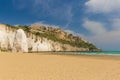 Golden sand beach of Vieste with Pizzomunno rock, Gargano peninsula, Apulia, South of Italy Royalty Free Stock Photo