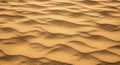 Golden sand dunes under warm sunlight create a textured and undulating surface. The ripples and Royalty Free Stock Photo