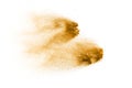 Golden sand explosion isolated on white background. Abstract sand splashing Royalty Free Stock Photo