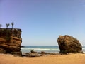 Golden sand and large rock on Biarritz beach, southern France in May Royalty Free Stock Photo