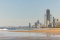 Golden sand of the Main Beach on the Gold Coast with the Surfers Paradise tourism destination city skyline in the distance, view Royalty Free Stock Photo