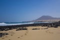 Golden sand with Mountain on Corralejo beach Canary islands Spain